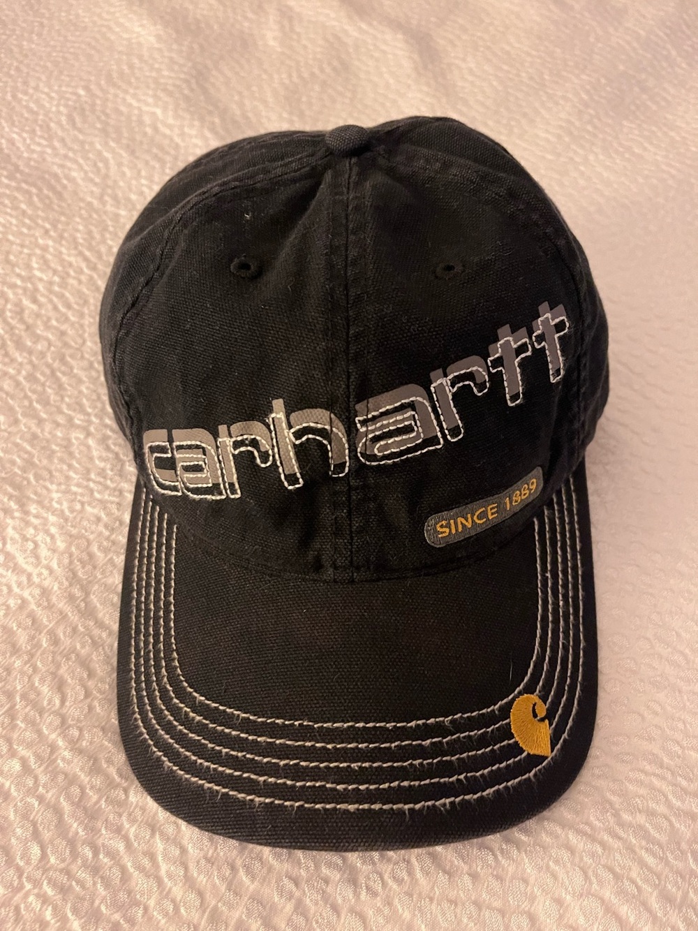 Carhartt Black Cap with White Stitching and Gold Accent